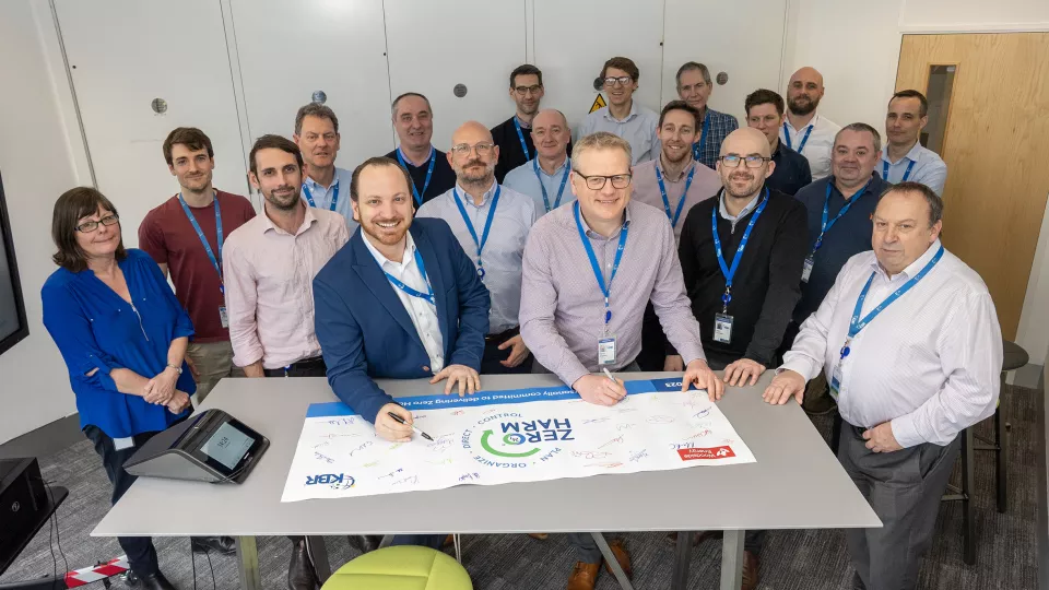 KBR employees signing Zero Harm commitment banner