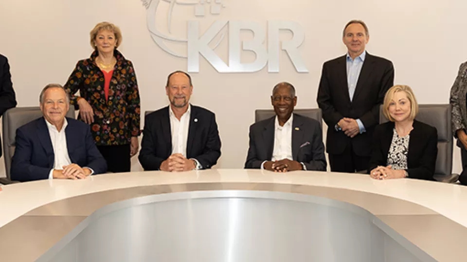 KBR employees in a conference room